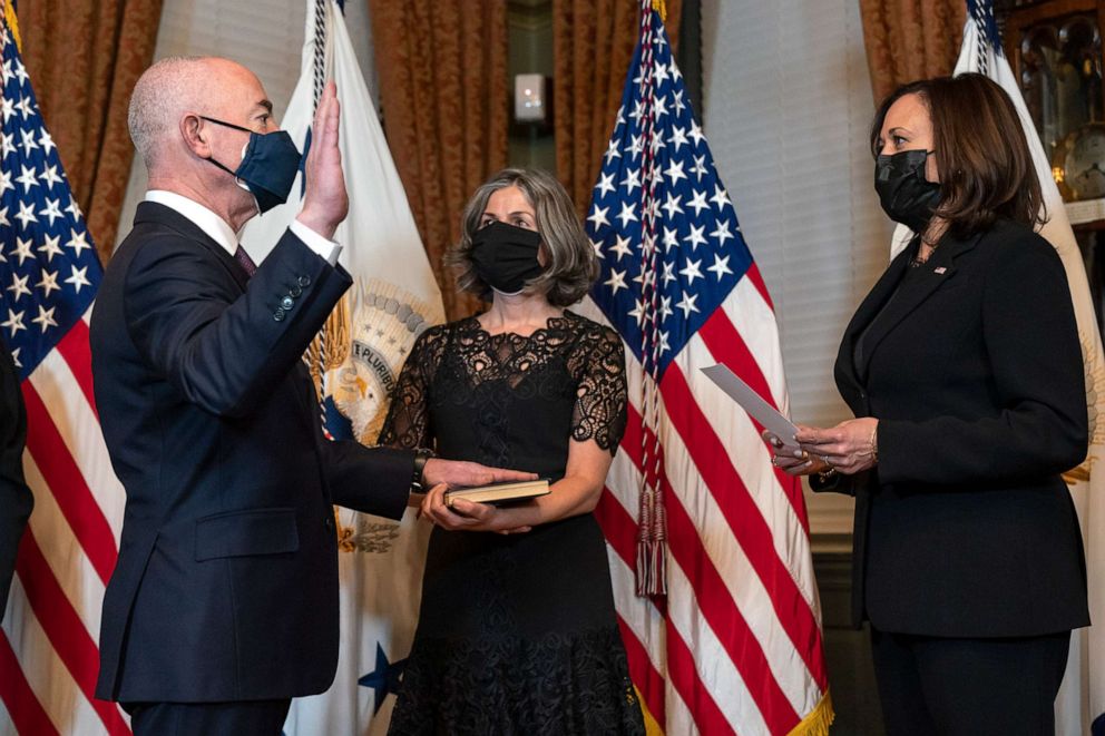 PHOTO: Vice President Kamala Harris swears in Alejandro Mayorkas as Secretary of the Department of Homeland Security, accompanied by his wife Tanya Mayorkas, Feb. 2, 2021, at the Eisenhower Executive Office Building in Washington, D.C.
