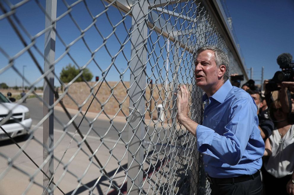 PHOTO: New York City Mayor Bill de Blasio stops at a gate after being told he could not cross through the gate to the tent facility setup at the Tornillo-Guadalupe Port of Entry, June 21, 2018 in Fabens, Texas.