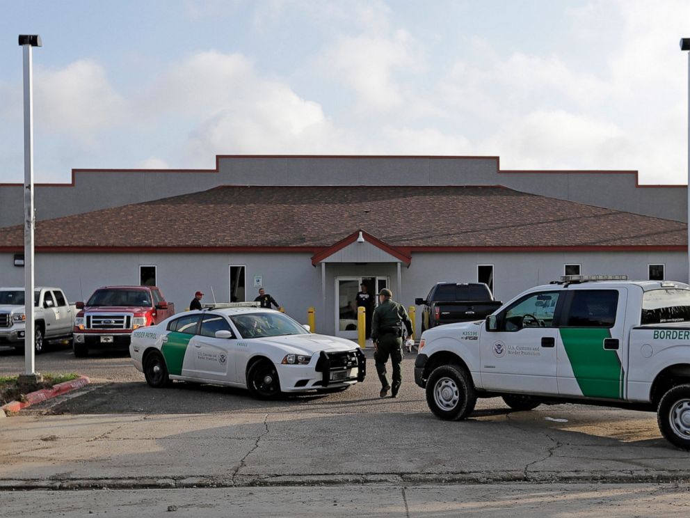 PHOTO: In this Saturday, June 23, 2018, file photo, a U.S. Border Patrol Agent walks between vehicles outside the Central Processing Center in McAllen, Texas