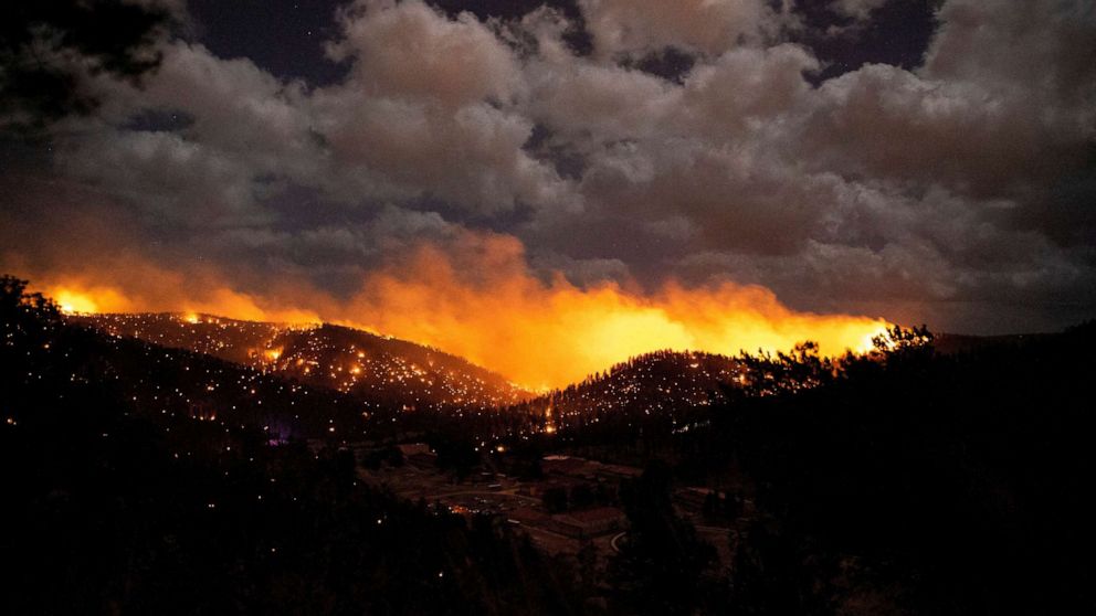 PHOTO: The McBride Fire burns in the heart of the village in Ruidoso, New Mexico, April 12, 2022.