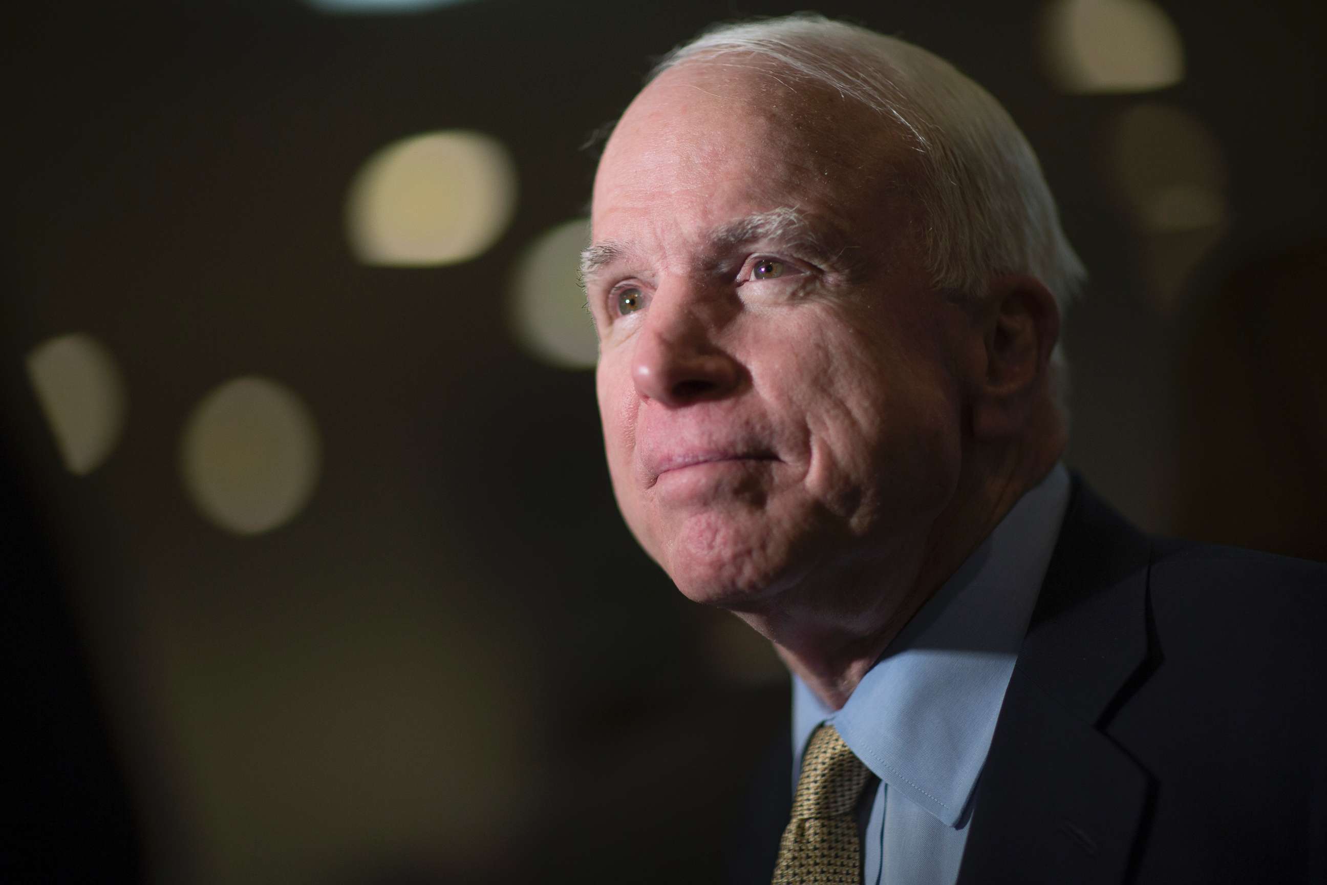 PHOTO: Senator John McCain, a Republican from Arizona, speaks to the media after leaving the Senate floor in Washington, Feb. 12, 2014. 