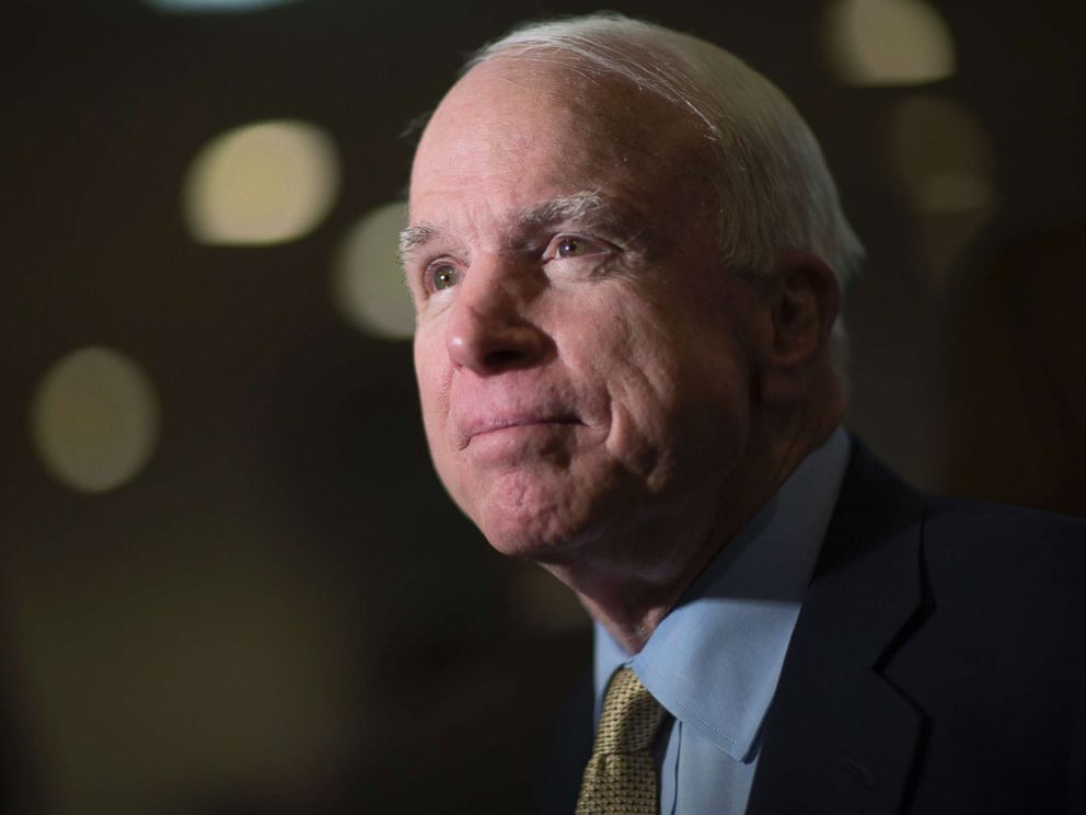 PHOTO: Senator John McCain, a Republican from Arizona, speaks to the media after leaving the Senate floor in Washington, Feb. 12, 2014.