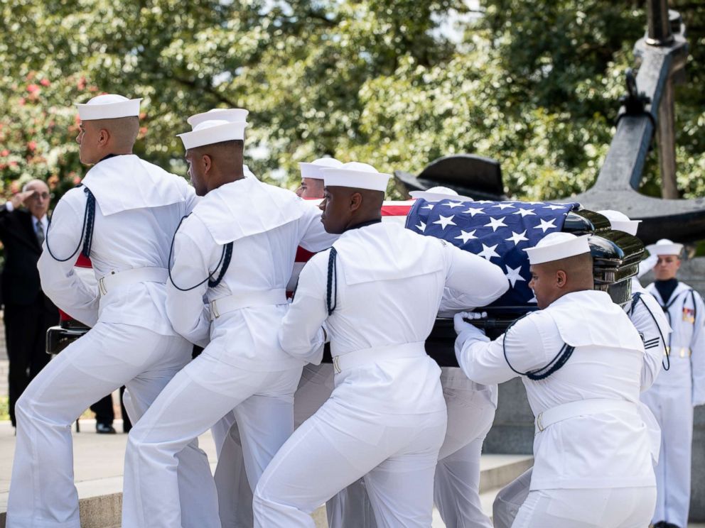Navy Body Bearers move the casket of the late Sen. John McCain from his processional hearse to the United States Naval Academy Chapel, Sept. 2, 2018. John Sidney McCain, III graduated from the United States Naval Academy in 1958.