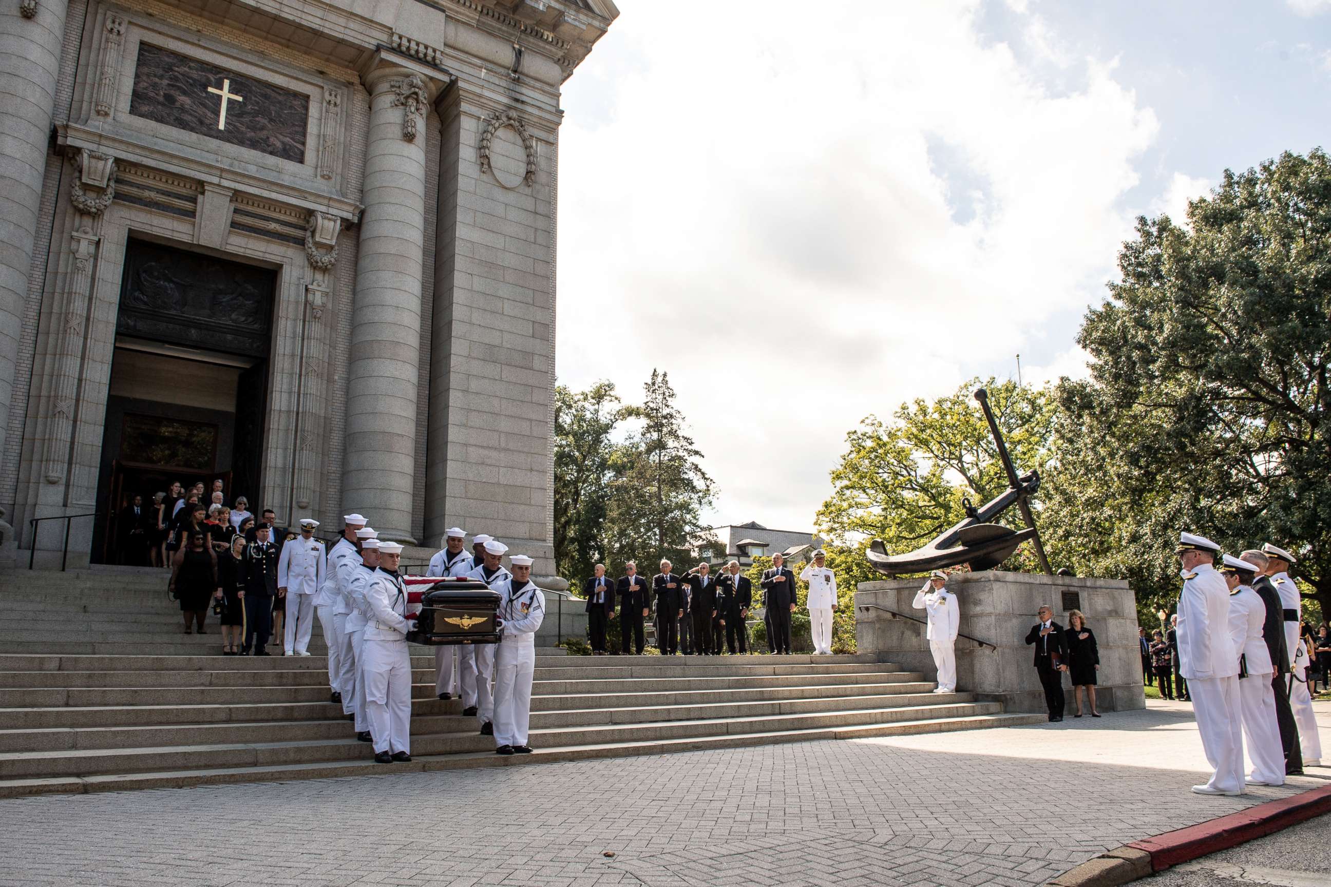 Navy Body Bearers move the casket of the late Senator John McCain to a horse-drawn caisson after his funeral service at the United States Naval Academy Chapel, Sept. 2, 2018. John Sidney McCain, III graduated from the United States Naval Academy in 1958. 