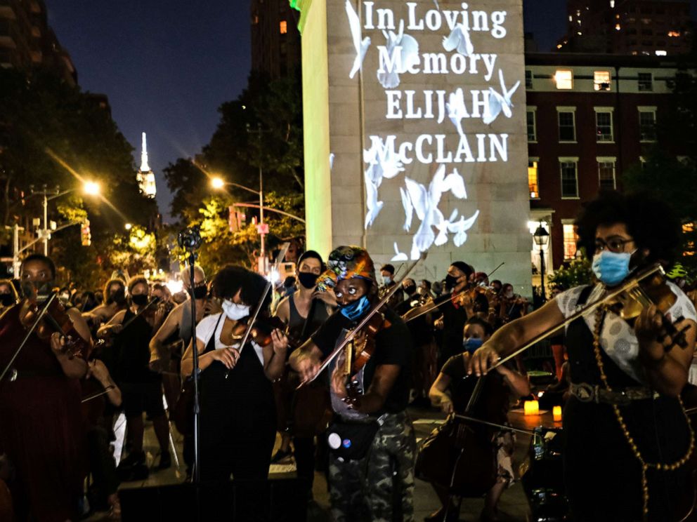 PHOTO: String players perform during a violin vigil for Elijah McClain in Washington Square Park in New York City, June 29, 2020.