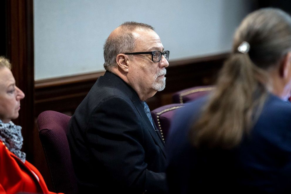 PHOTO: Greg McMichael, center, listens to jury selection proceedings for the trial of him and his son, Travis McMichael, and their neighbor, William "Roddie" Bryan, at the Glynn County Courthouse, Oct. 25, 2021, in Brunswick, Ga. 