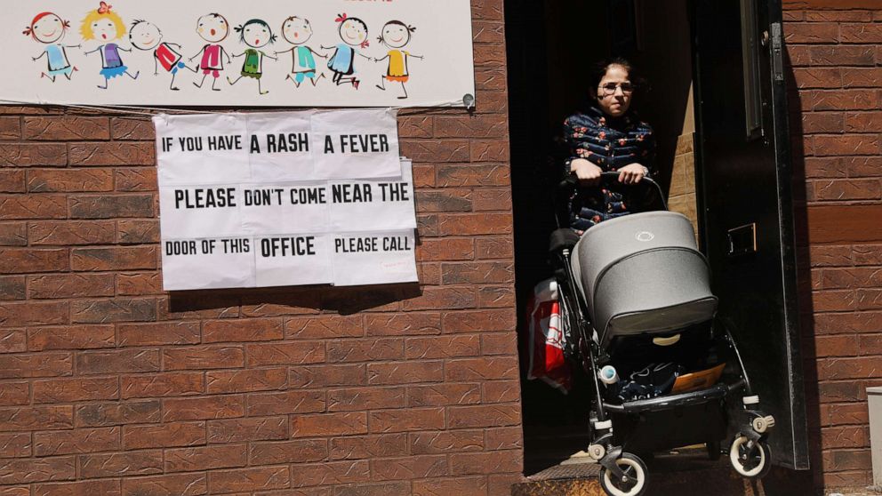 A sign warns people of measles in the ultra-Orthodox Jewish community in Williamsburg on April 10, 2019 in New York.