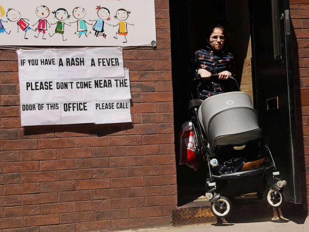 PHOTO: A sign warns people of measles in the ultra-Orthodox Jewish community in Williamsburg on April 10, 2019 in New York.