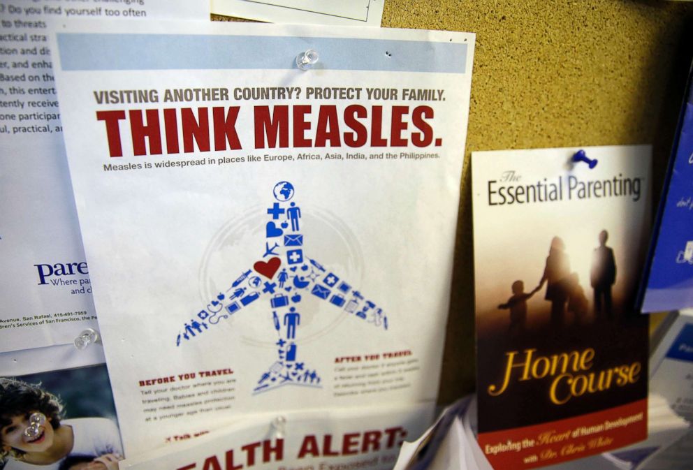 PHOTO: A flyer educating parents about measles is displayed on a bulletin board at a pediatrics clinic in Greenbrae, Calif., Feb. 6, 2015.