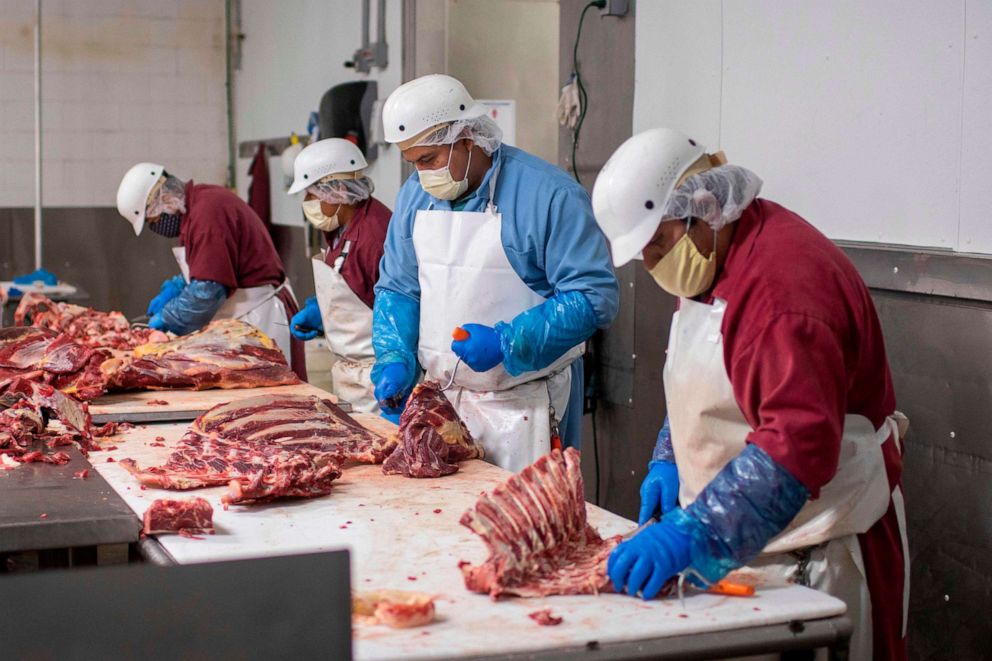 PHOTO: Butchers chop up beef at Jones Meat & Food Services in Rigby, Idaho, May 26, 2020. 