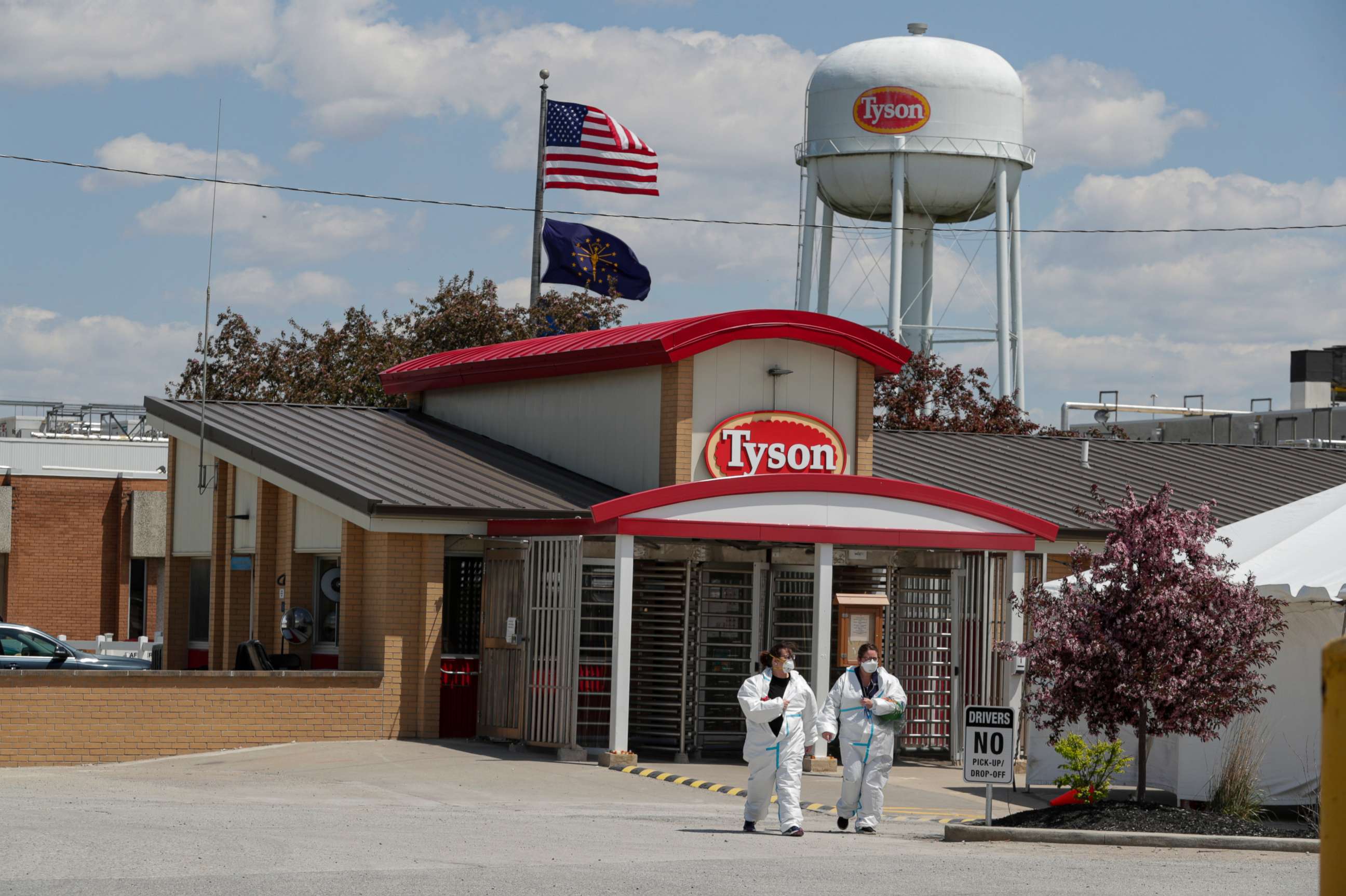 PHOTO: Workers leave the Tyson Foods pork processing plant in Logansport, Ind., May 7, 2020.
