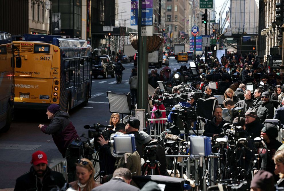 PHOTO: Members of the media wait outside Trump Tower as former President Donald Trump is expected to arrive in New York City, April 3, 2023.