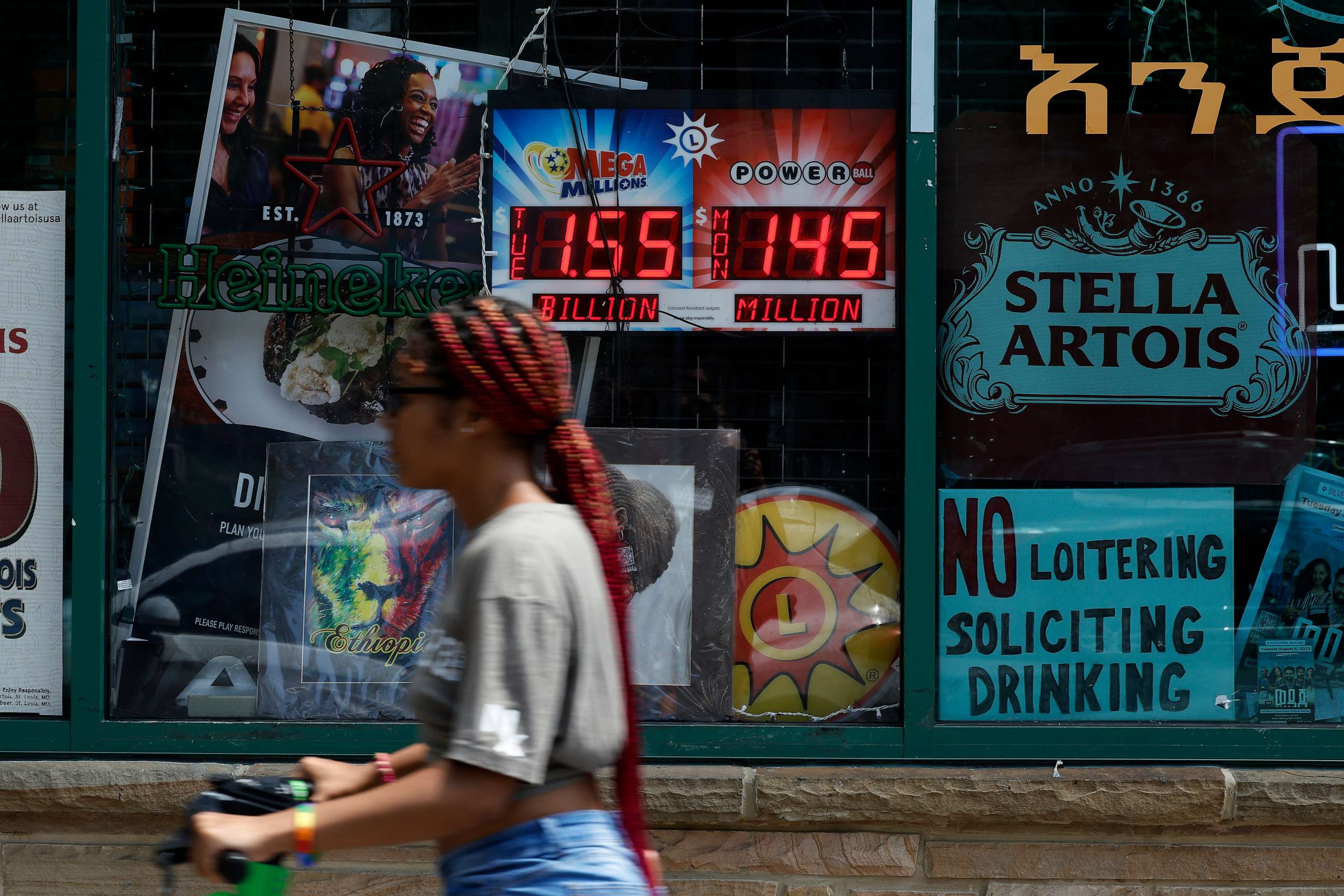 PHOTO: An electronic sign advertises the Mega Millions and Power Ball jackpot amounts outside a convenience store on August 7, 2023 in Silver Spring, Maryland.
