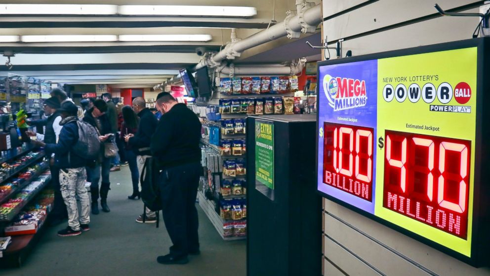 PHOTO: Lottery players buy Mega Millions lottery tickets, Friday Oct. 19, 2018, in New York. The estimated jackpot for Friday's drawing has soared to $1 billion.