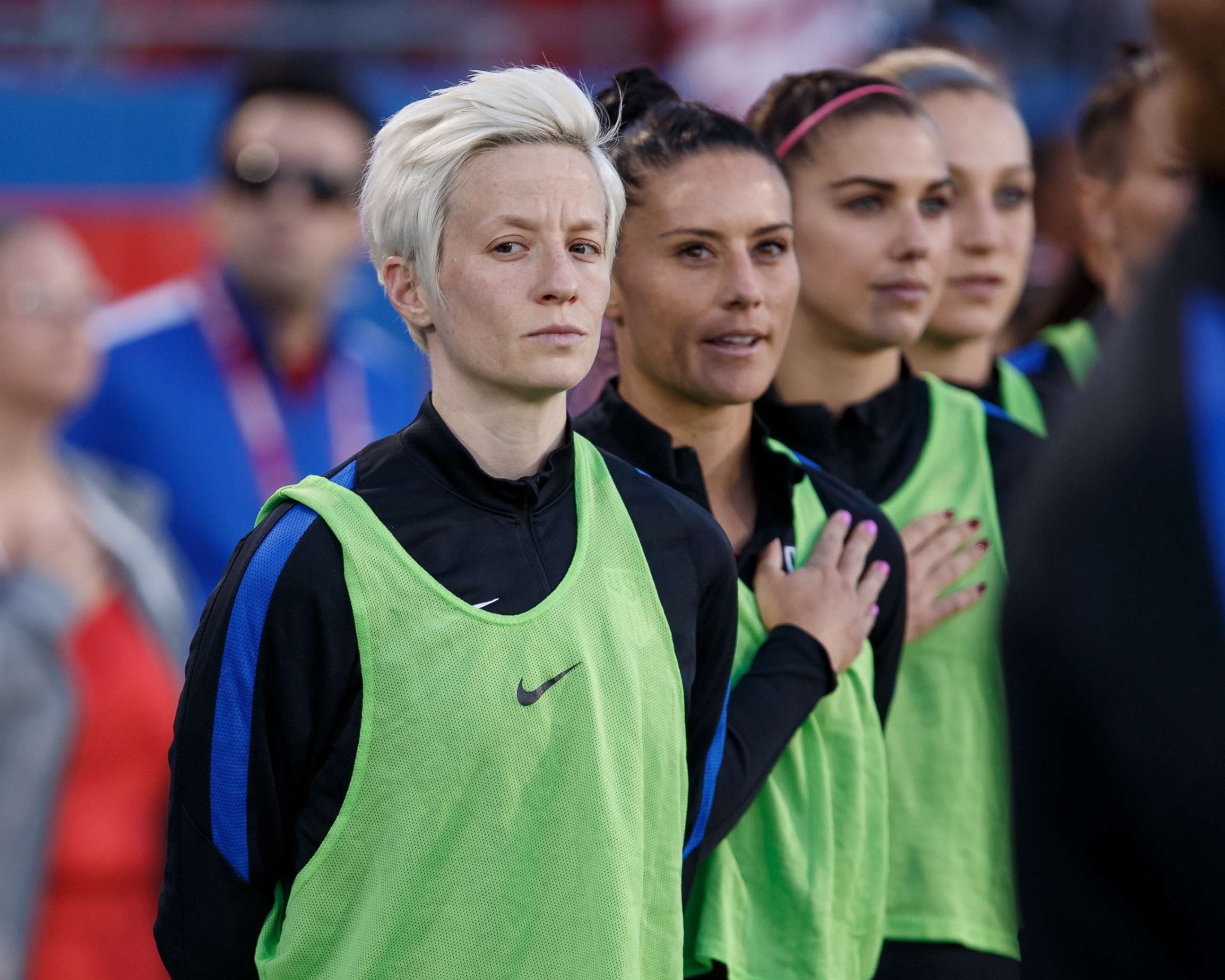 PHOTO:Megan Rapinoe and teammates stand during the national anthem during the International Friendly match between the USA and Russia on April 6, 2017, at Toyota Stadium in Frisco, Texas.