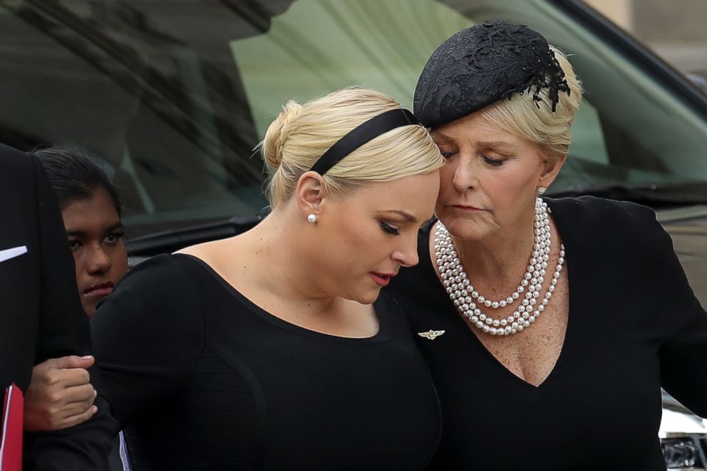 PHOTO: Meghan McCain and her mother Cindy McCain embrace as the casket of the late Sen. John McCain arrives at the Washington National Cathedral for the funeral service for McCain, on Sept. 1, 2018 in Washington, D.C.