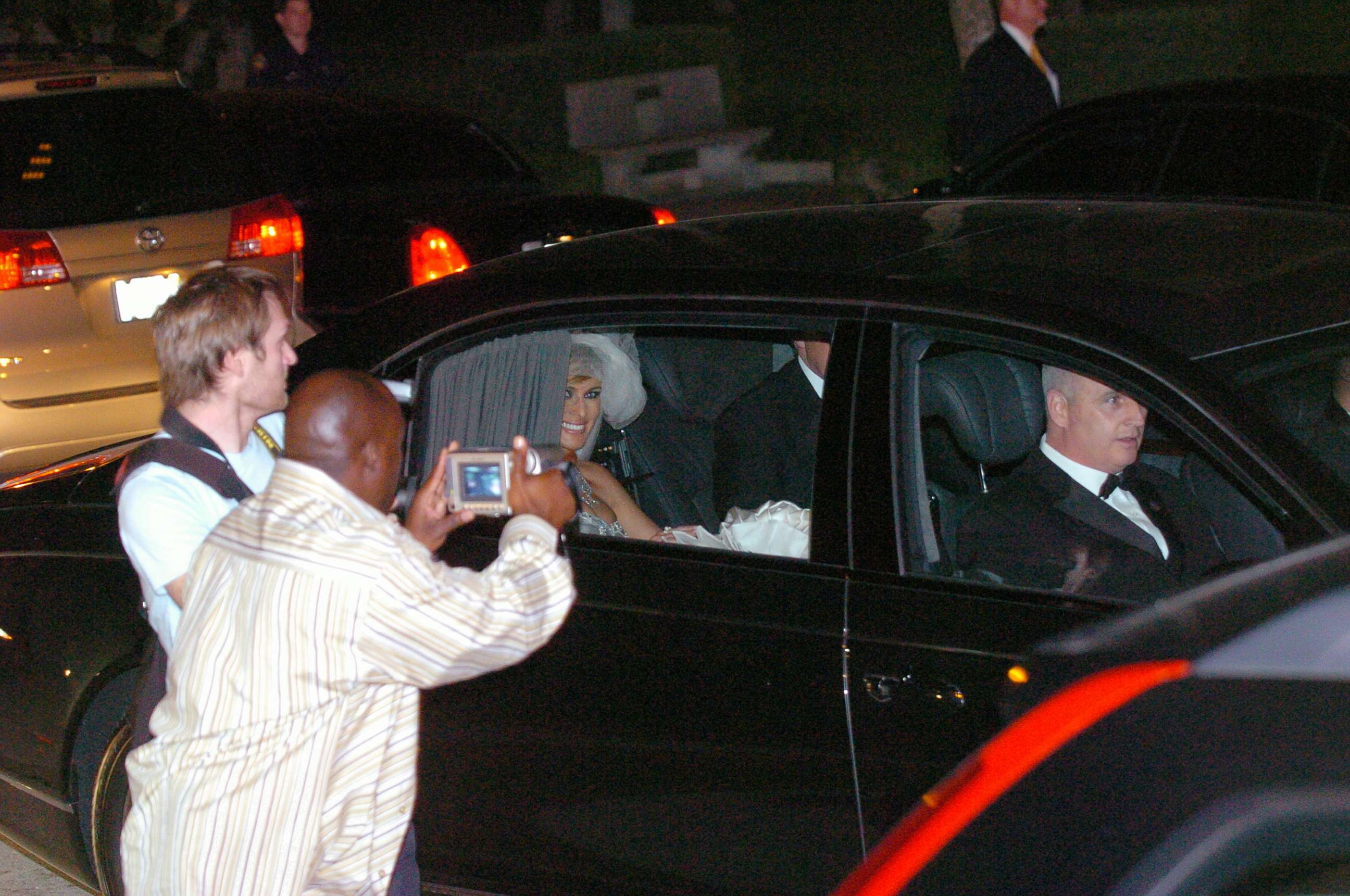 PHOTO: Photographers snap pictures as a beaming Melania Knauss and new husband Donald Trump  leave the Episcopal Church of Bethesda-by-the-Sea in Palm Beach, Fla., after their star-studded wedding ceremony, Jan. 22, 2005.