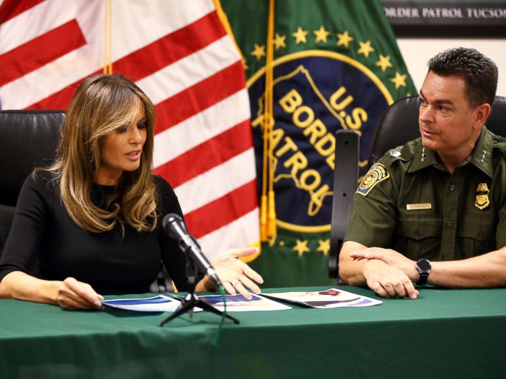 PHOTO: First lady Melania Trump looks at photos of an abandoned 6-year-old Costa Rican boy found in the desert recently during visit to the Tucson Sector office of the U.S. Customs and Border Protection.