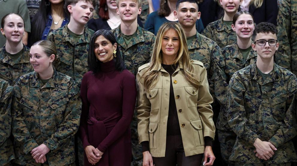 PHOTO: U.S. first lady Melania Trump and second lady Usha Vance meet with students as they visit Lejeune High School at Marine Corps Base Camp Lejeune, in Jacksonville, North Carolina, November 19, 2025.  