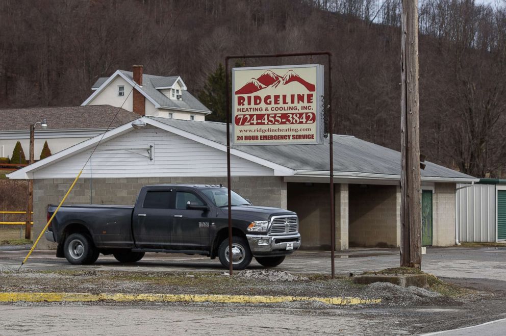 PHOTO: A truck sits near near Ed's Car Wash where several people were found dead and one injured after a shooting, Jan. 28, 2018 in Melcroft, Pa.