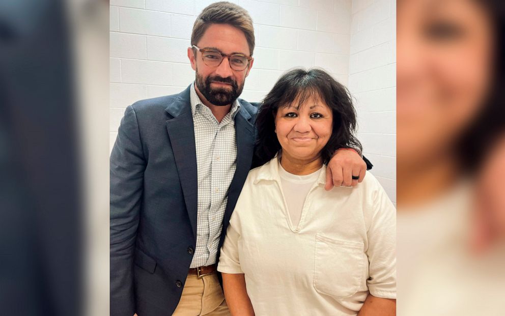 PHOTO: Jeff Leach stands next to death row inmate Melissa Lucio during a visit by a group of lawmakers to the Mountain View Unit in Gatesville, Texas on April 6, 2022. The lawmakers visited Lucio to update her about their efforts to stop her execution.

