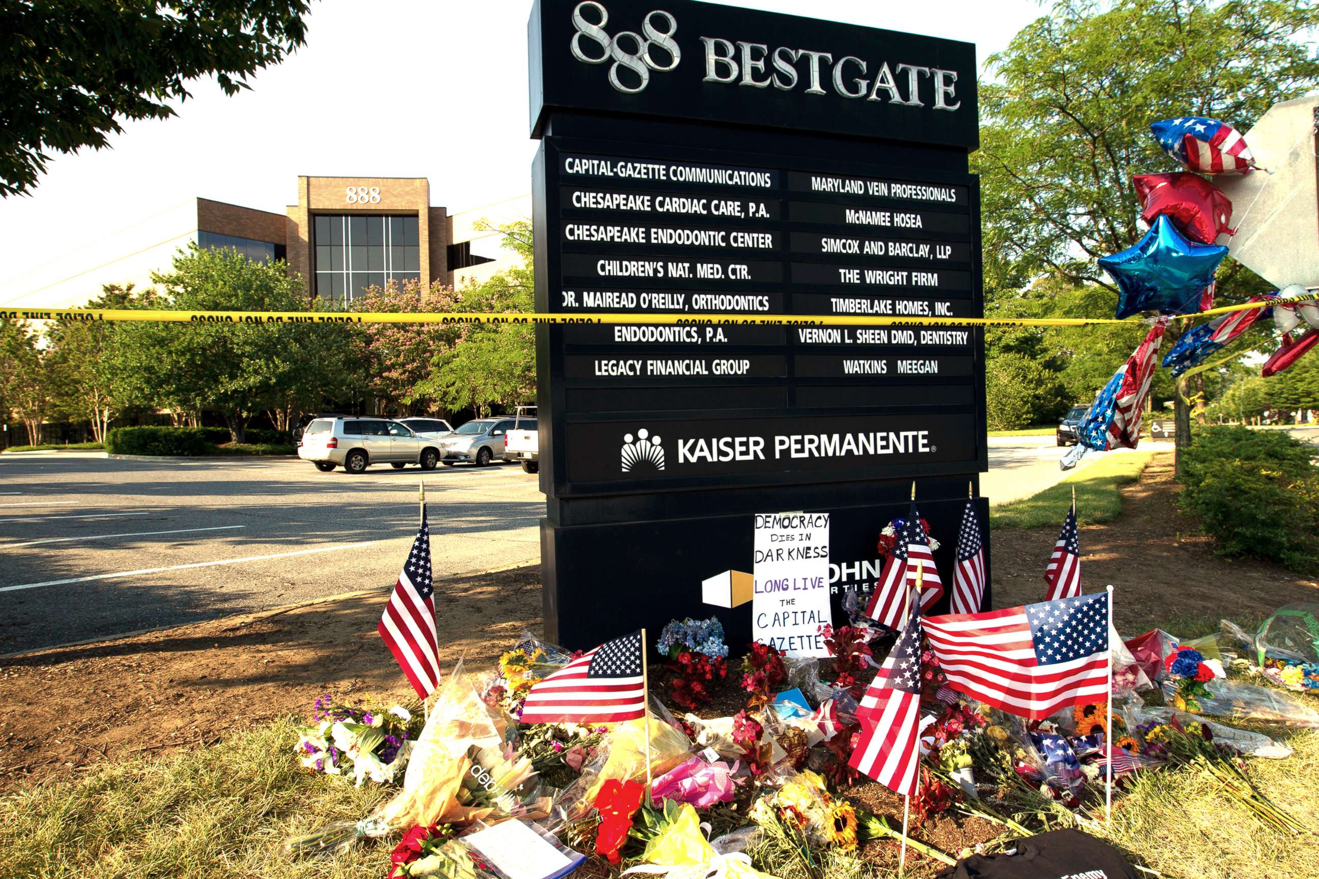 PHOTO: A makeshift memorial is seen at the scene outside the office building housing The Capital Gazette newspaper in Annapolis, Md., July 1, 2018.