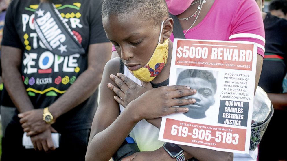 PHOTO: Protesters listen to speeches at city hall during the march for justice Quawan Charles who disappeared and was found dead near Loreauville, La., Nov. 14, 2020.