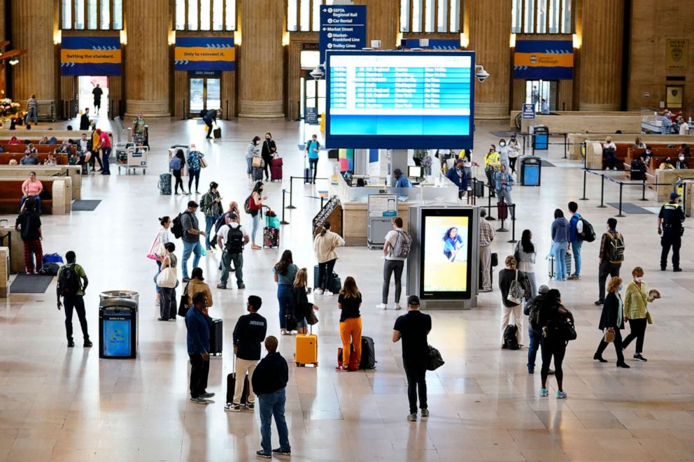 PHOTO: Travelers make their way through 30th Street Station ahead of Memorial Day weekend, May 27, 2022, in Philadelphia, Pa.