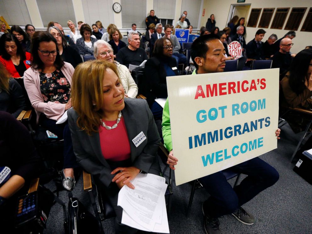 PHOTO: Congressional hopeful Tamara Harris, l, and Brian Lee join many community members and activists at the Mendham Township Committee Meeting in Mendham Township, N.J., Feb. 12, 2018.