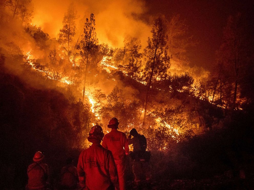 PHOTO: Firefighters monitor a backfire while battling the Ranch Fire, part of the Mendocino Complex Fire, Aug. 7, 2018, near Ladoga, Calif.