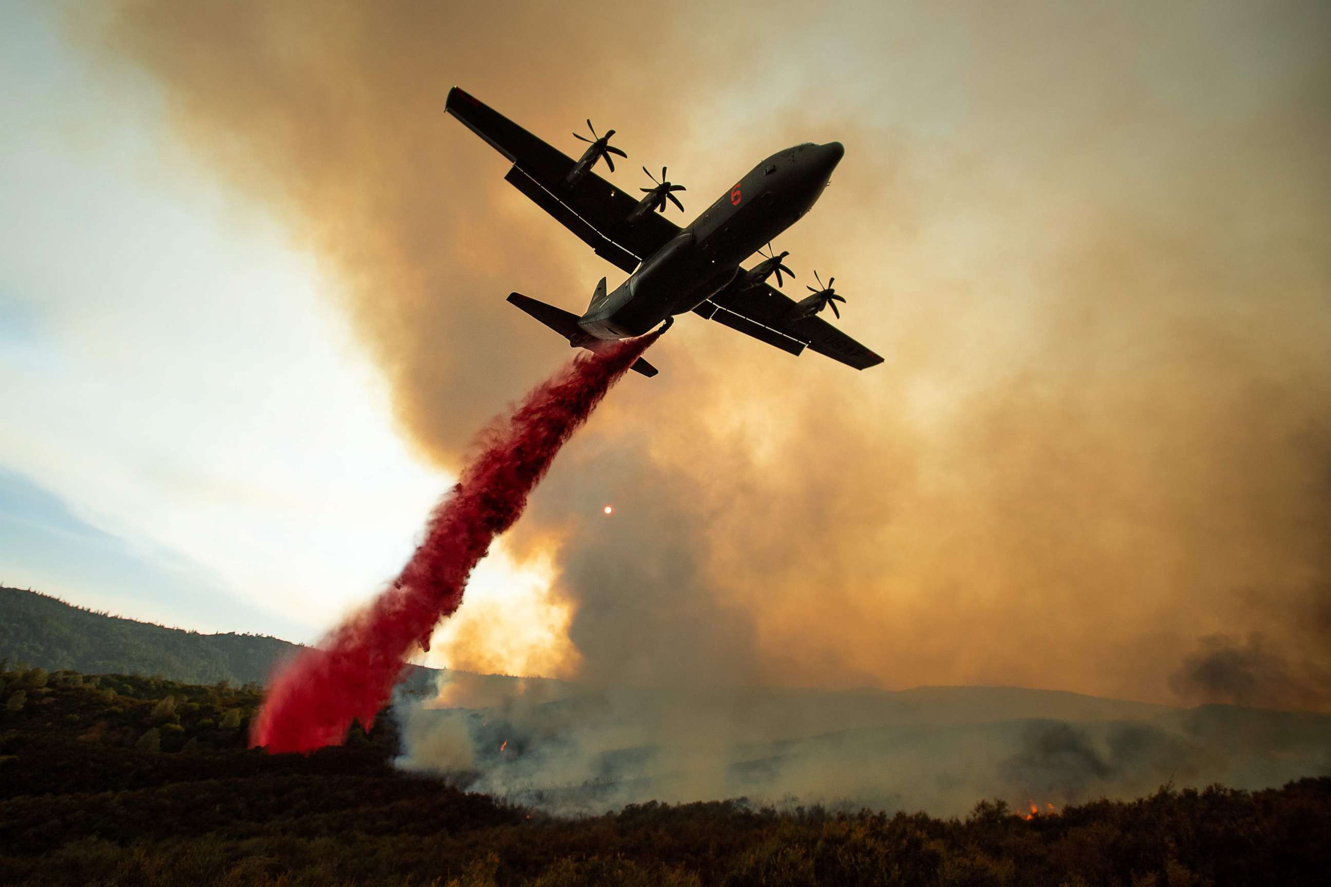 PHOTO: An air tanker drops retardant on the Ranch Fire, part of the Mendocino Complex Fire, burning along High Valley Rd near Clearlake Oaks, California, Aug. 5, 2018.
