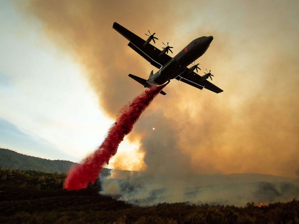 PHOTO: An air tanker drops retardant on the Ranch Fire, part of the Mendocino Complex Fire, burning along High Valley Rd near Clearlake Oaks, California, Aug. 5, 2018.