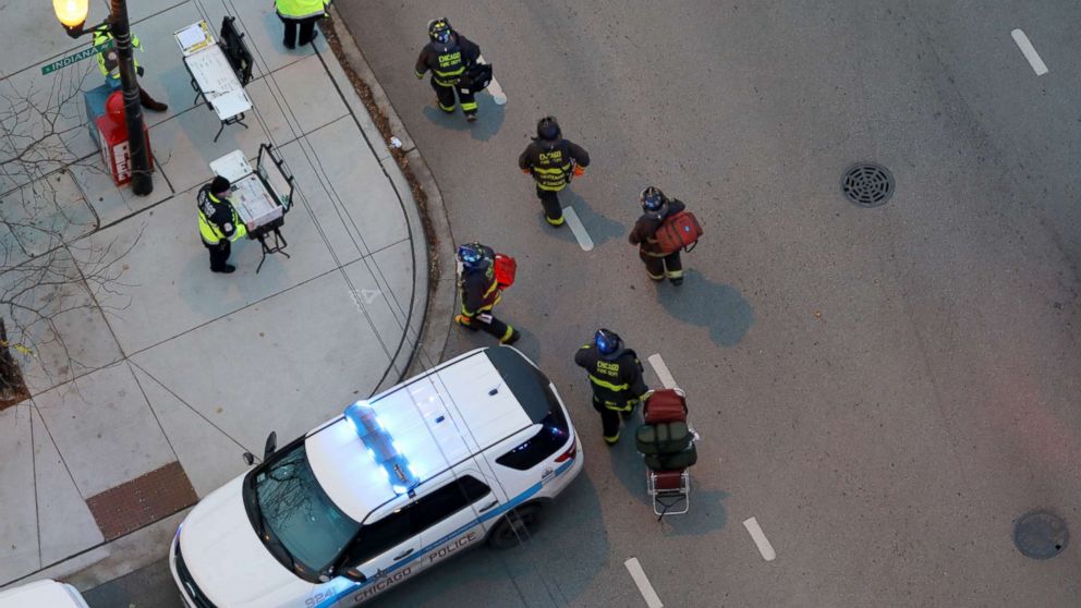 Officials work at an entrance at Mercy Hospital, Nov. 19, 2018. Multiple people, including a Chicago police officer, were reported shot at the Near South Side hospital.