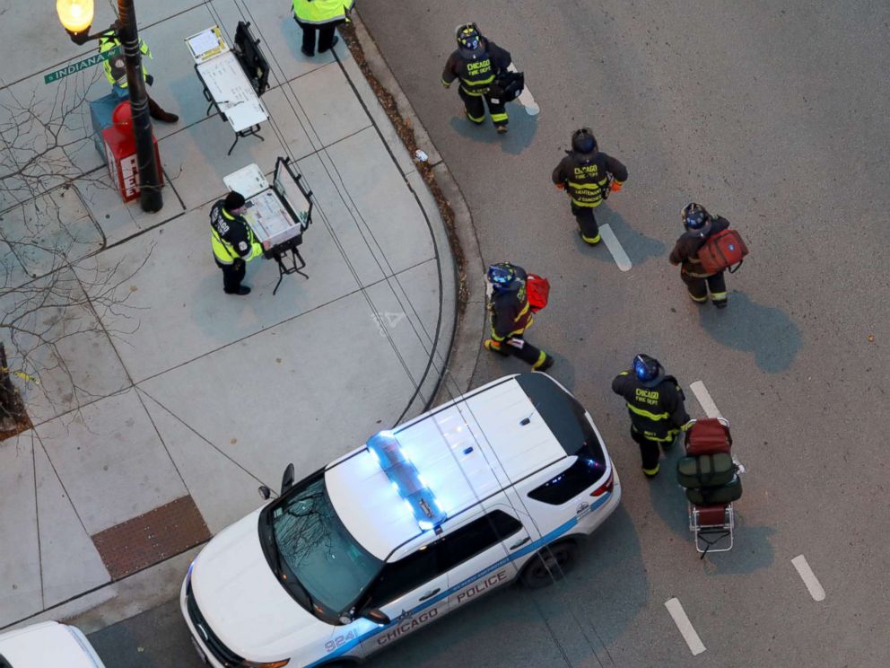 PHOTO: Officials work at an entrance at Mercy Hospital, Nov. 19, 2018. Multiple people, including a Chicago police officer, were reported shot at the Near South Side hospital.