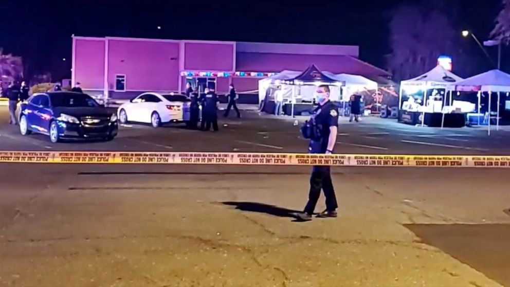 PHOTO: A police officers stand in a parking lot following a shooting that took place the night of Oct. 16, 2020, in Meza, Ariz.