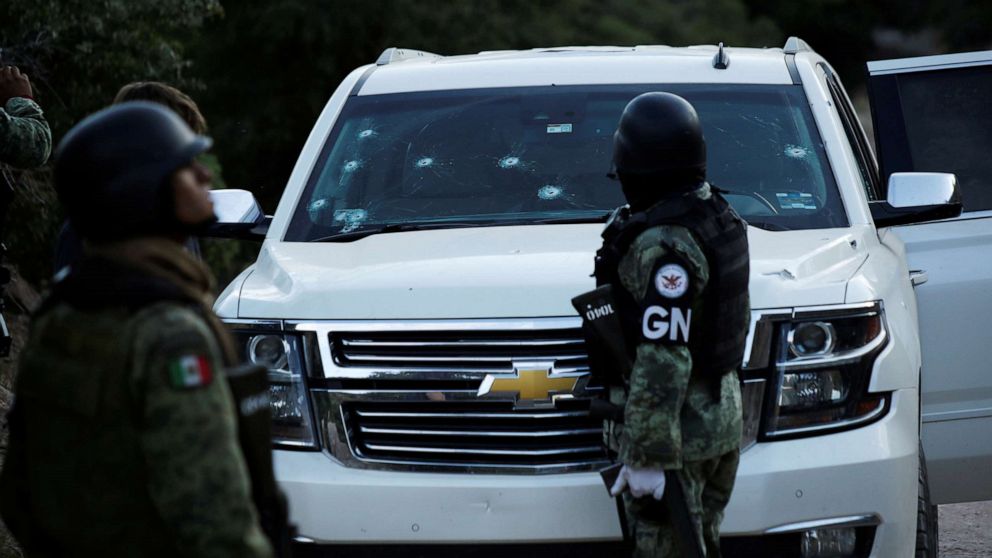 PHOTO: Soldiers assigned to Mexico's National Guard stand by a bullet-riddled vehicle belonging to one of the Mexican-American Mormon families that were killed by unknown assailants, in Bavispe, Sonora state, Mexico, Nov. 5, 2019. 