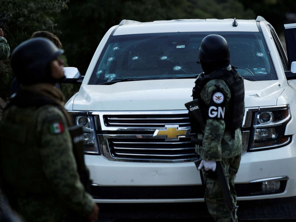 PHOTO: Soldiers assigned to Mexicos National Guard stand by a bullet-riddled vehicle belonging to one of the Mexican-American Mormon families that were killed by unknown assailants, in Bavispe, Sonora state, Mexico, Nov. 5, 2019. 