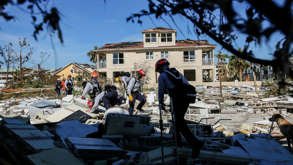PHOTO: Members from South Florida Task Force search a flattened home destroyed by Hurricane Michael in Mexico Beach, Fla., Friday, Oct. 12, 2018, after Hurricane Michael went through the area on Wednesday.