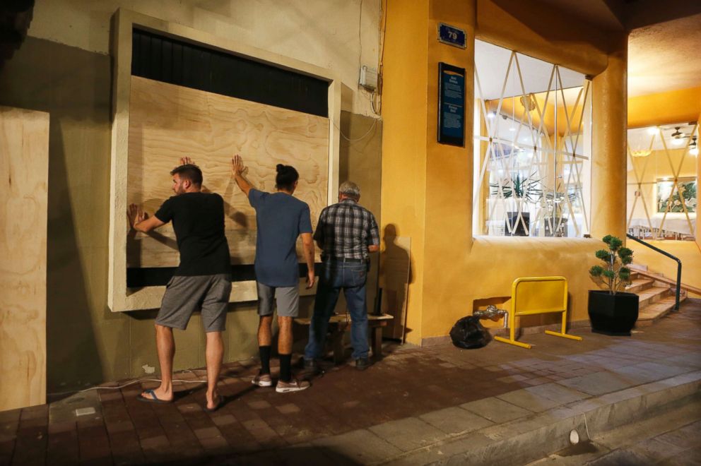 PHOTO: Residents cover windows with wood ahead of Hurricane Willa in Mazatlan, Mexico, Oct. 22, 2018.