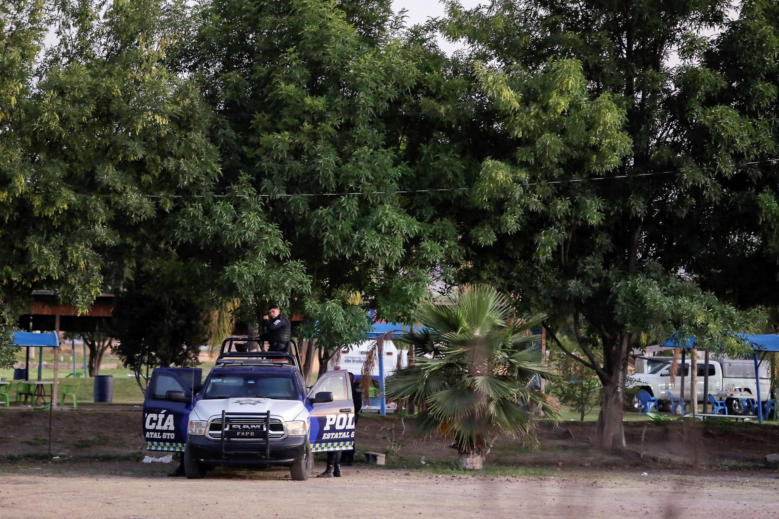 PHOTO: Authorities work at a crime scene where gunmen killed several people including a minor after storming a water park, in Cortazar, Guanajuato state, Mexico April 15, 2023.