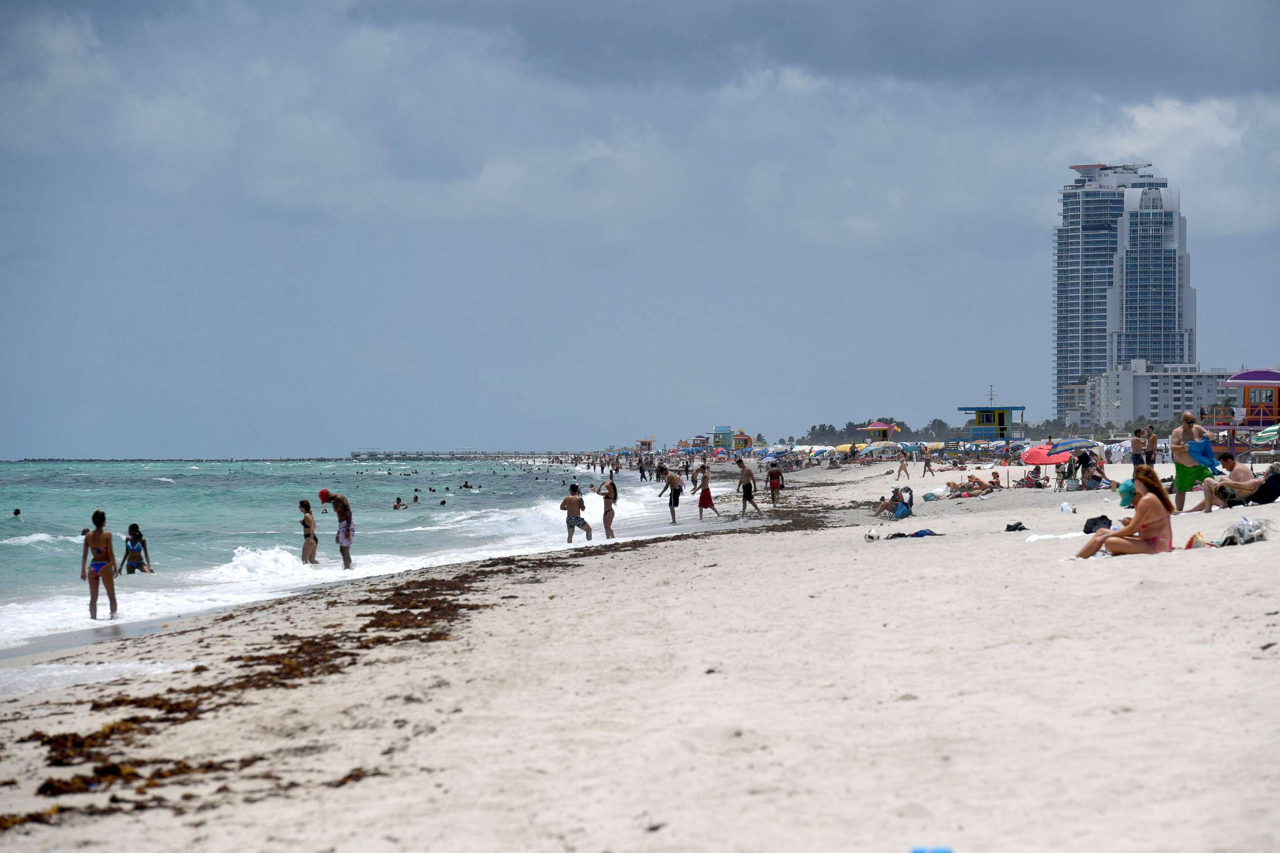 PHOTO: People are seen going about their activities as beaches re-open in accordance with Miami Dade County's Phase 1 during the Coronavirus COVID-19 pandemic, June 12, 2020, in Miami.