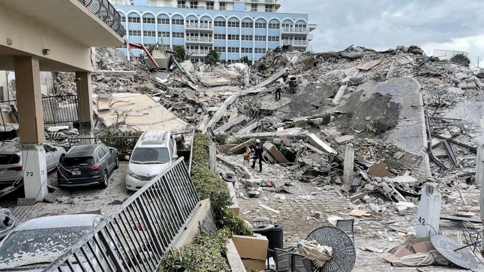 PHOTO: Emergency personnel work at the site of a partially collapsed building in Surfside near Miami Beach, Fla., June 24, 2021.