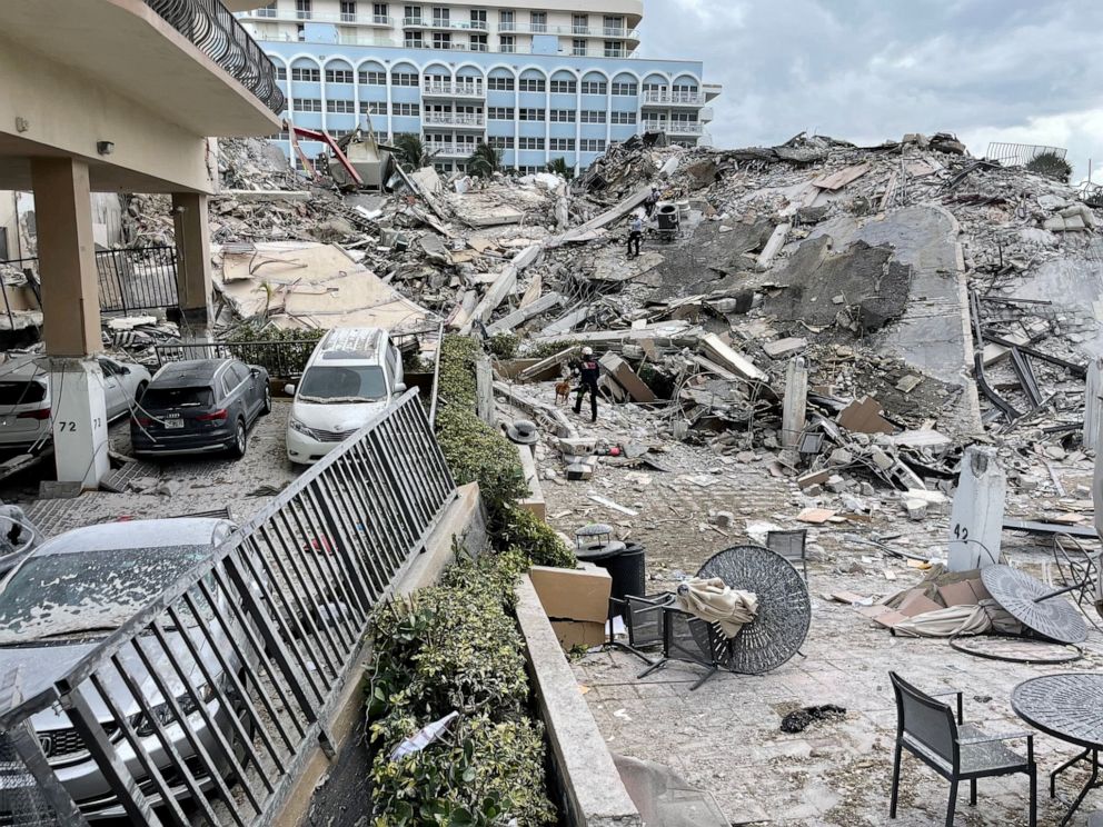 PHOTO: Emergency personnel work at the site of a partially collapsed building in Surfside near Miami Beach, Fla., June 24, 2021.