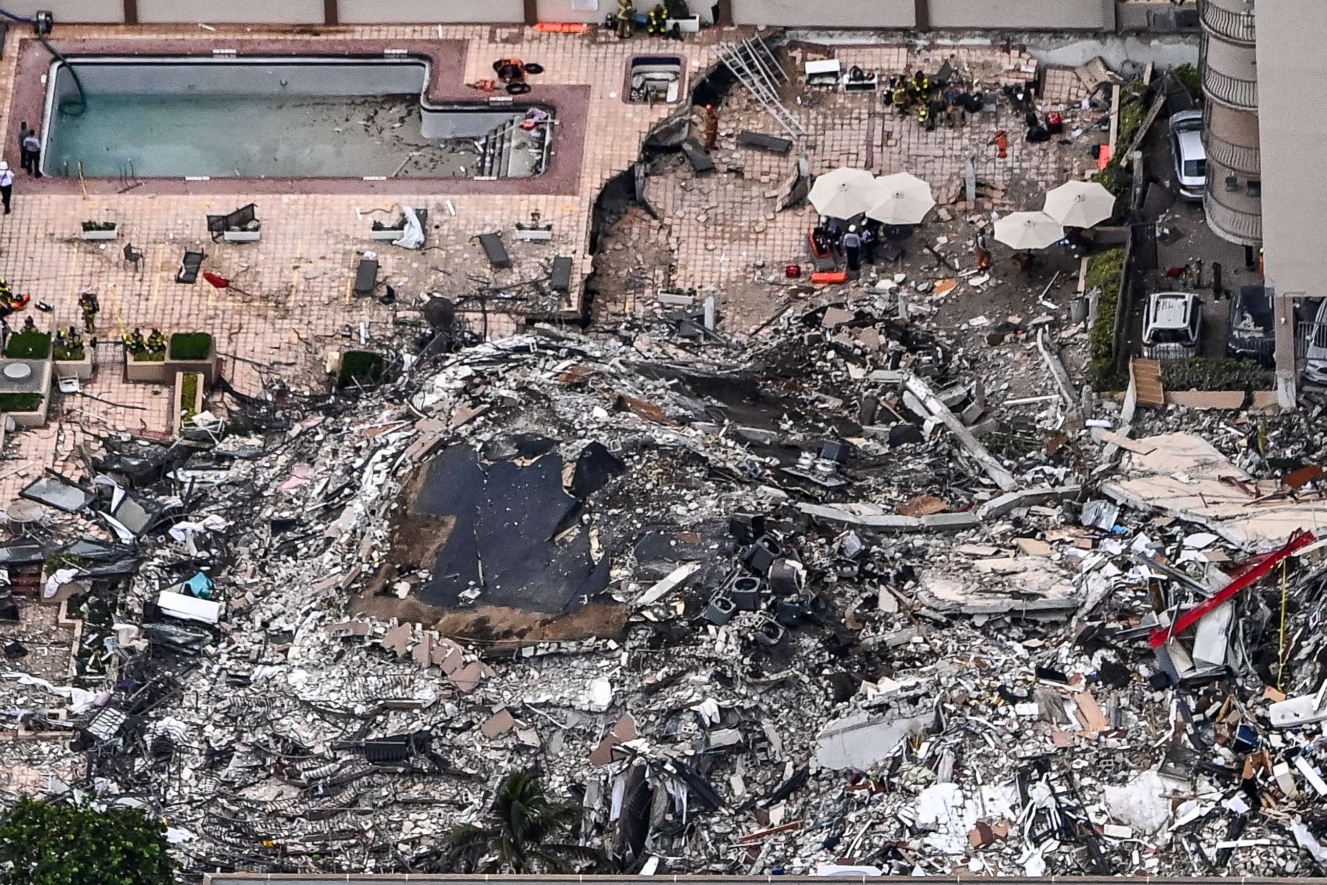 PHOTO: Search and rescue personnel work onsite after the partial collapse of the Champlain Towers South in Surfside, Fla., north of Miami Beach, on June 24, 2021.