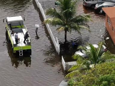 Florida deluge ending as heat wave moves east