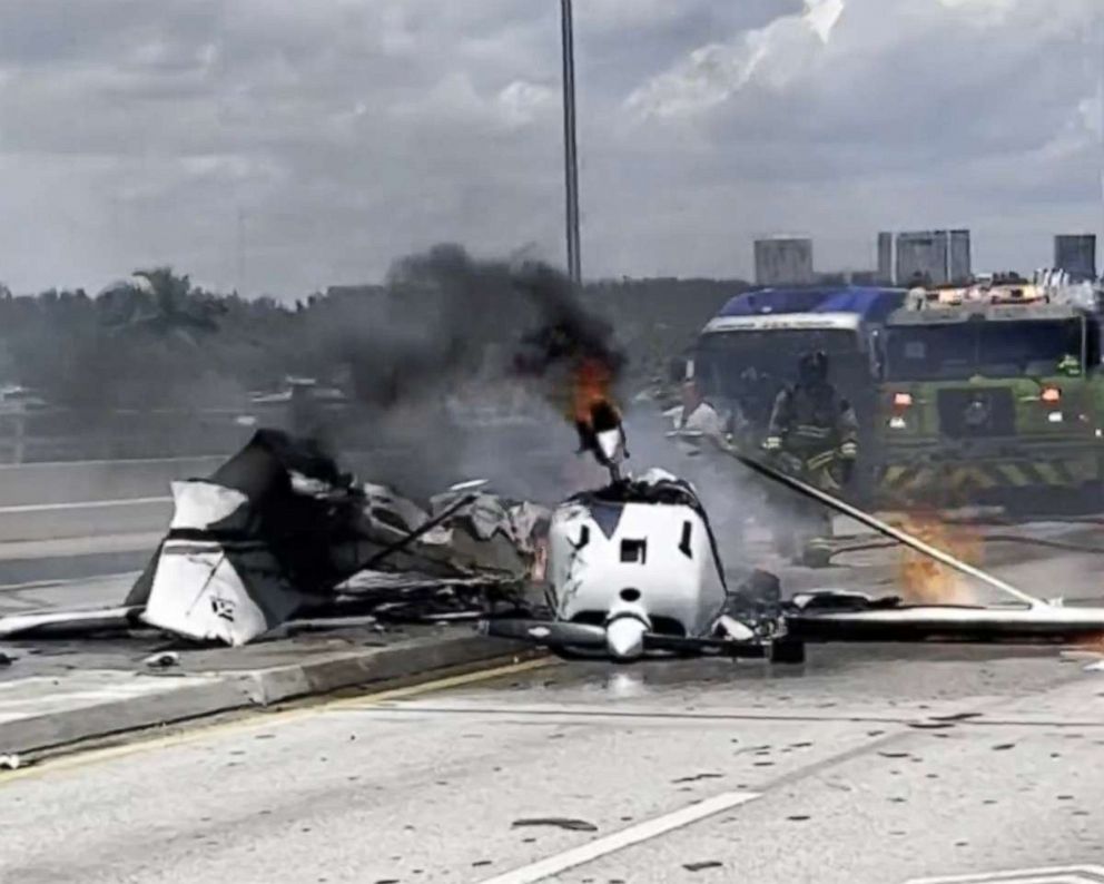 PHOTO: A small plane crash-landed onto a Miami bridge Saturday, May 14, 2022, striking a vehicle, officials said.