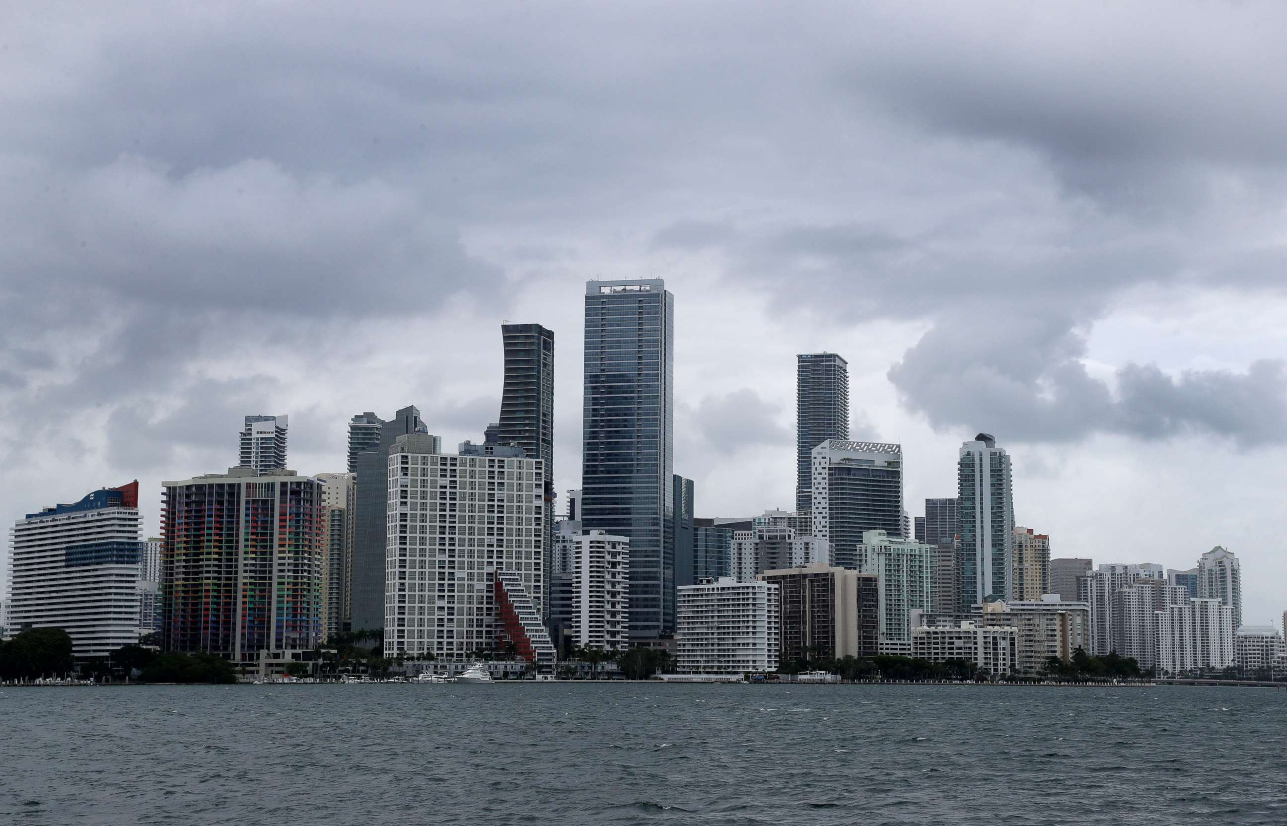 PHOTO: Clouds loom over the Miami skyline, May 14, 2020. 