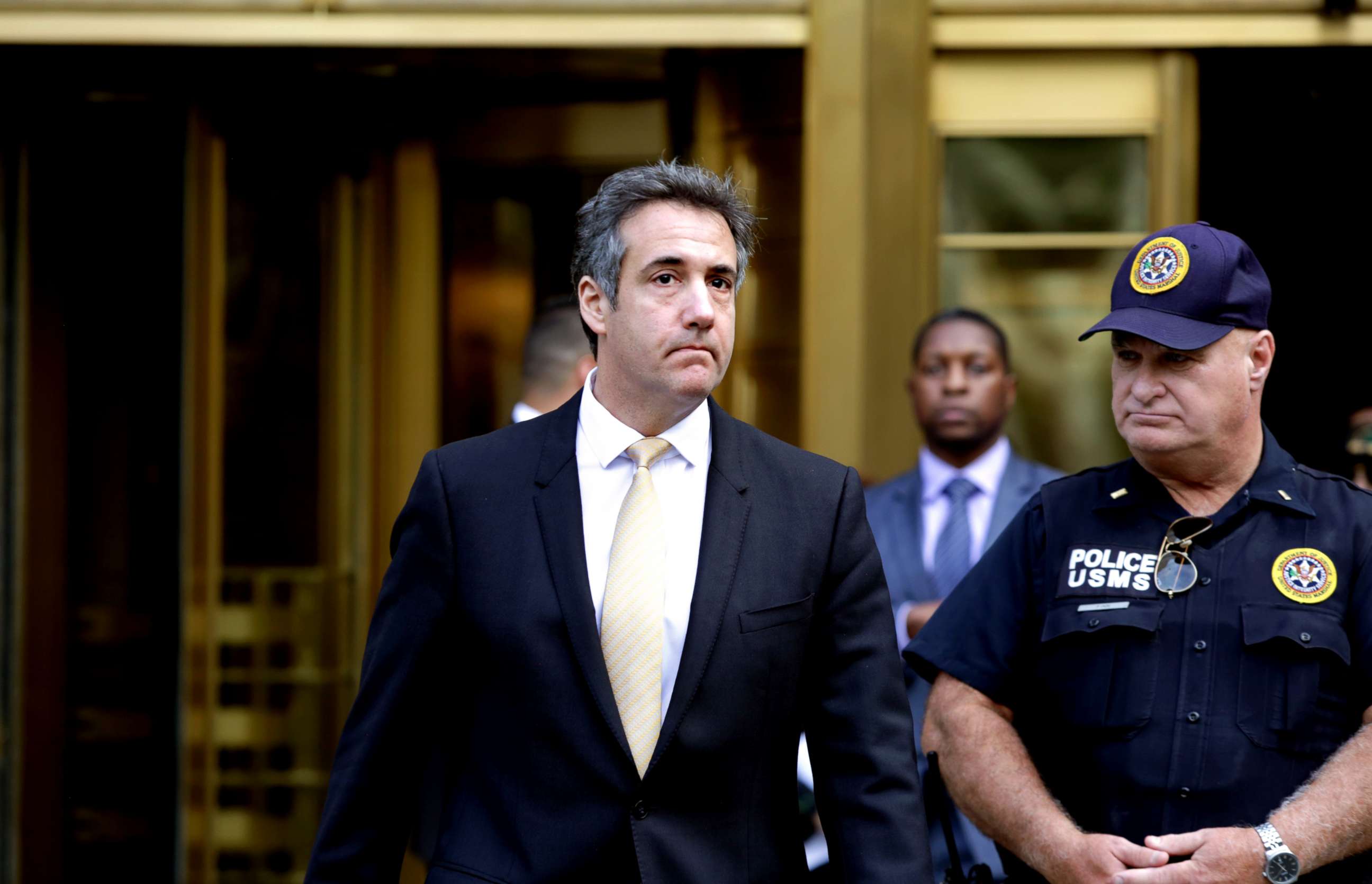 PHOTO: Michael Cohen, the former lawyer to President Donald Trump, exits the Federal Courthouse, Aug. 21, 2018, in New York City.