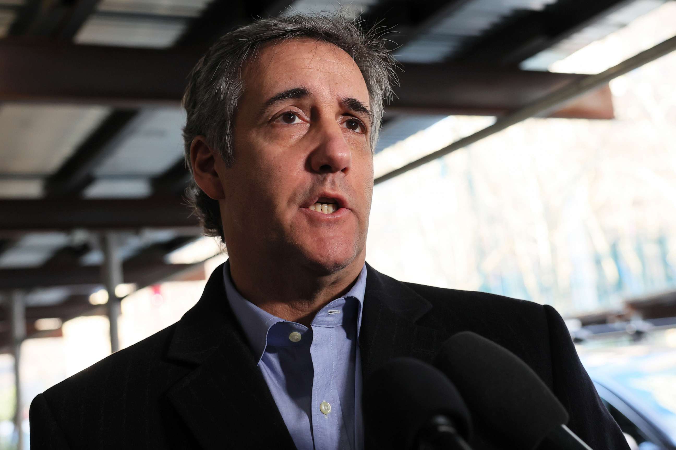 PHOTO: Former Trump Attorney Michael Cohen gives a short statement to members of the press as he arrives to meet with the Manhattan District Attorney on February 8, 2023 in New York City.