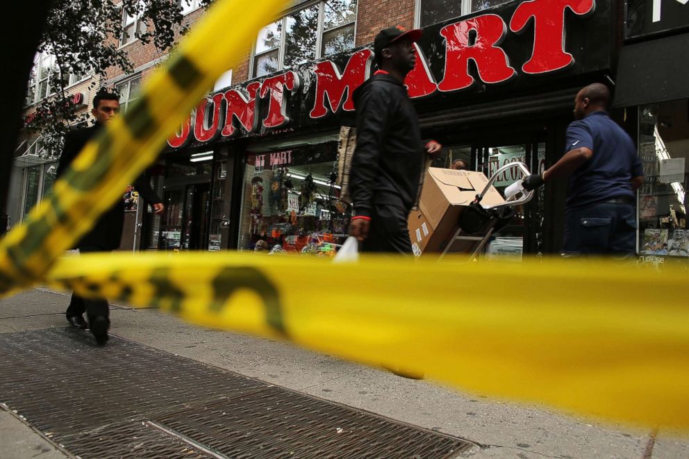 PHOTO: Police crime scene tape is placed near where the body of Michael Jones, a New York Red Bulls youth soccer coach, was found early Sunday morning outside a Levi's store, Oct. 8, 2012, in New York City.
